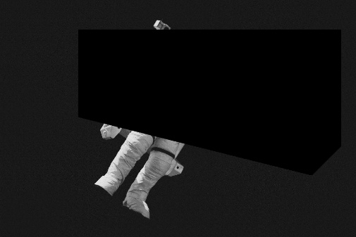 An astronaut in space where most of the astronaut is covered by black pixels